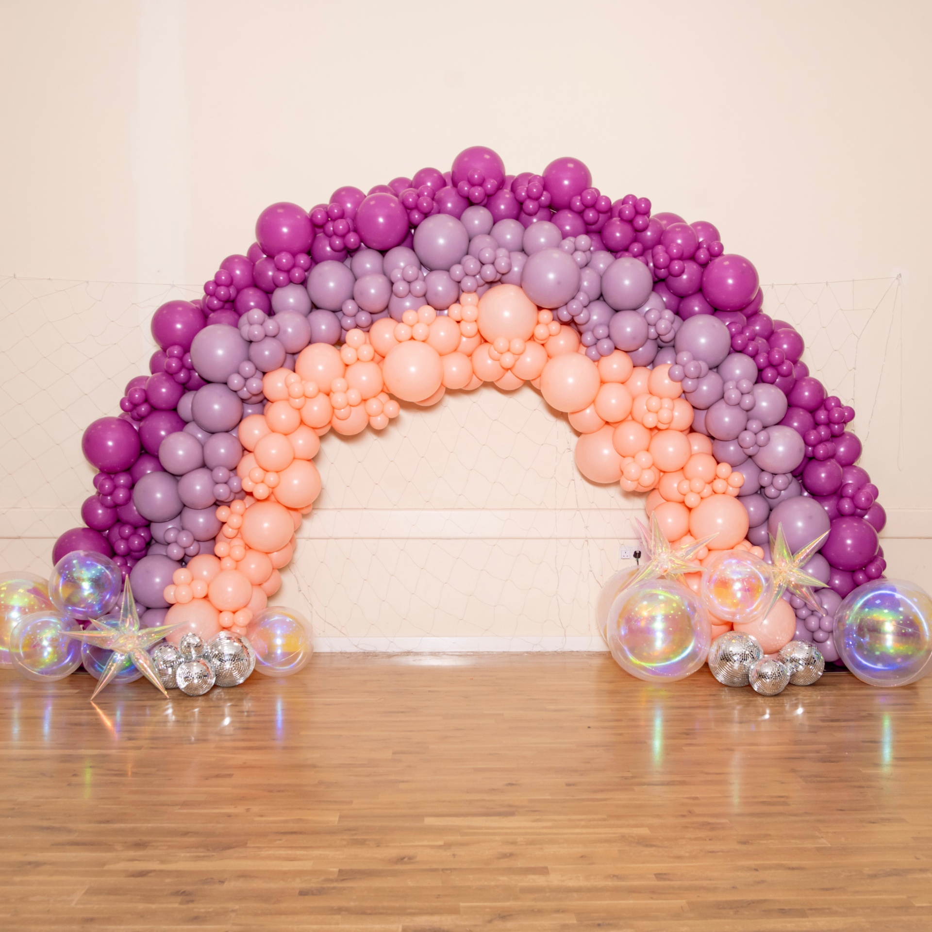 Rainbow balloon arch display